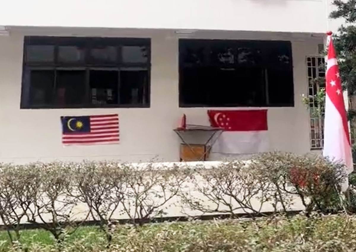 ‘Looking for trouble’: Malaysia flag hung outside HDB flat raises eyebrows, Singapore News