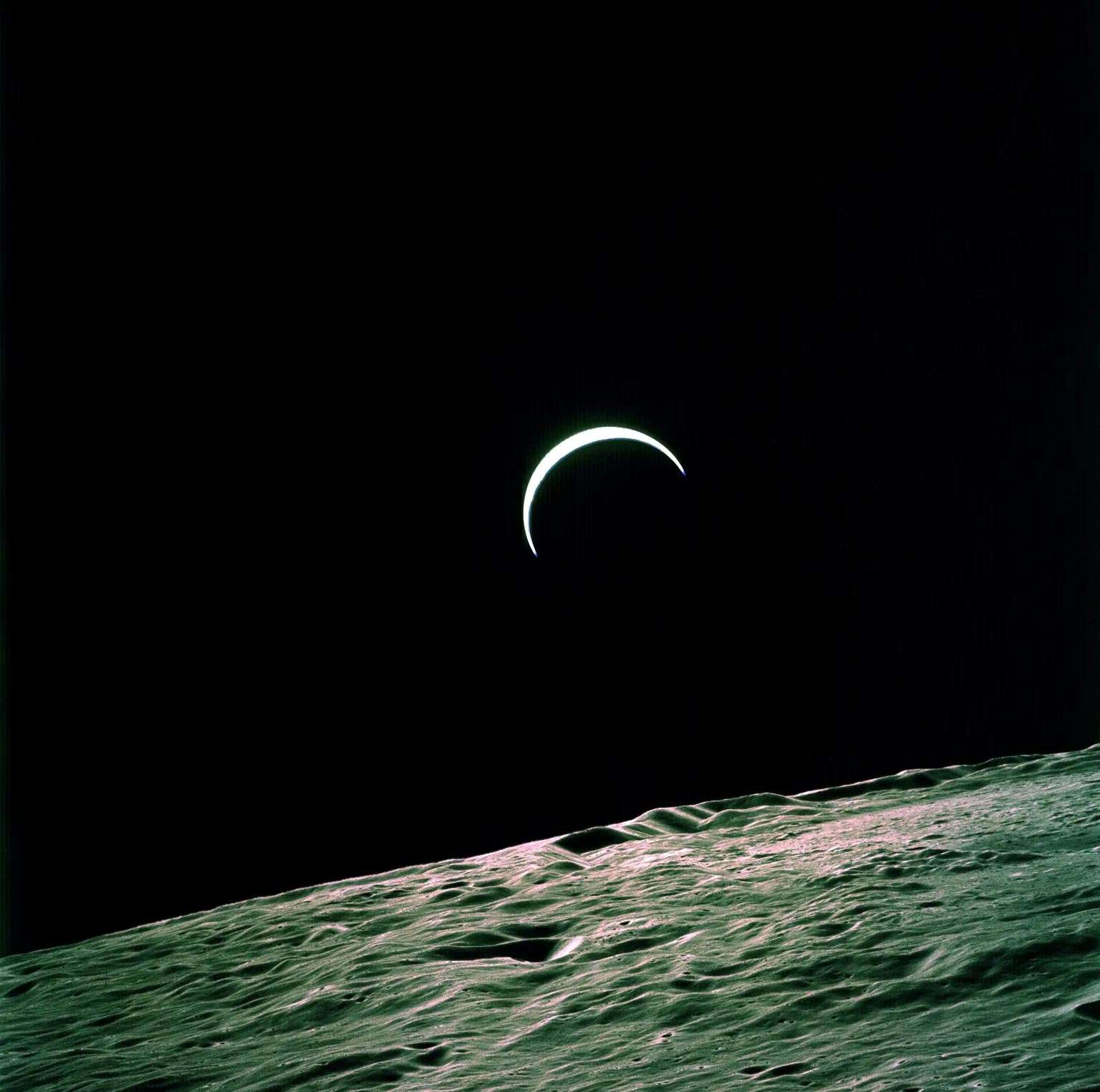 NASA’s Apollo 15 Captures Earth’s Crest Over the Lunar Horizon