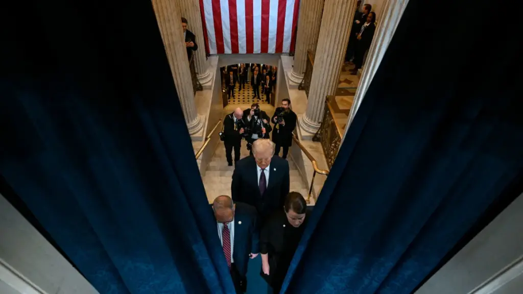 Trump enters the Capitol Rotunda on Monday.